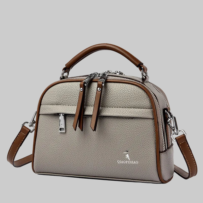 Casual women's handbag with shoulder strap