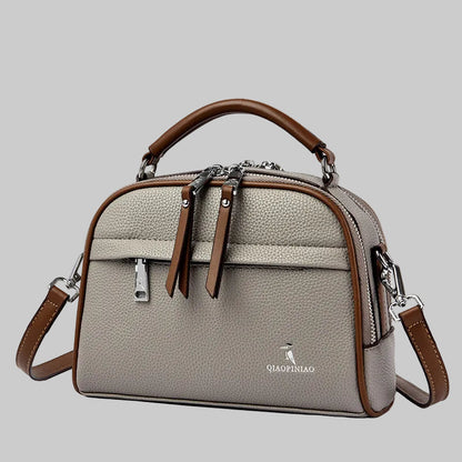 Casual women's handbag with shoulder strap