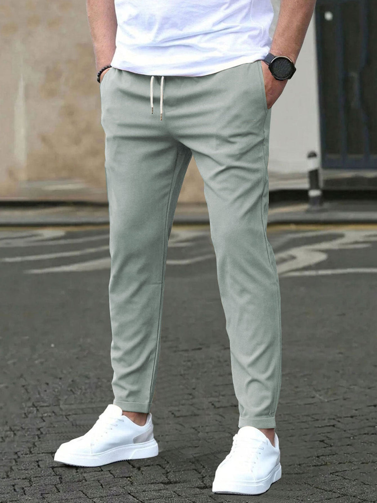 Men's cropped pants with leather tag