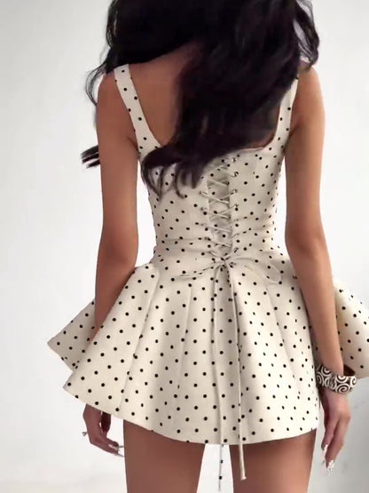 Women’s chic polka dot mini dress with fitted waist