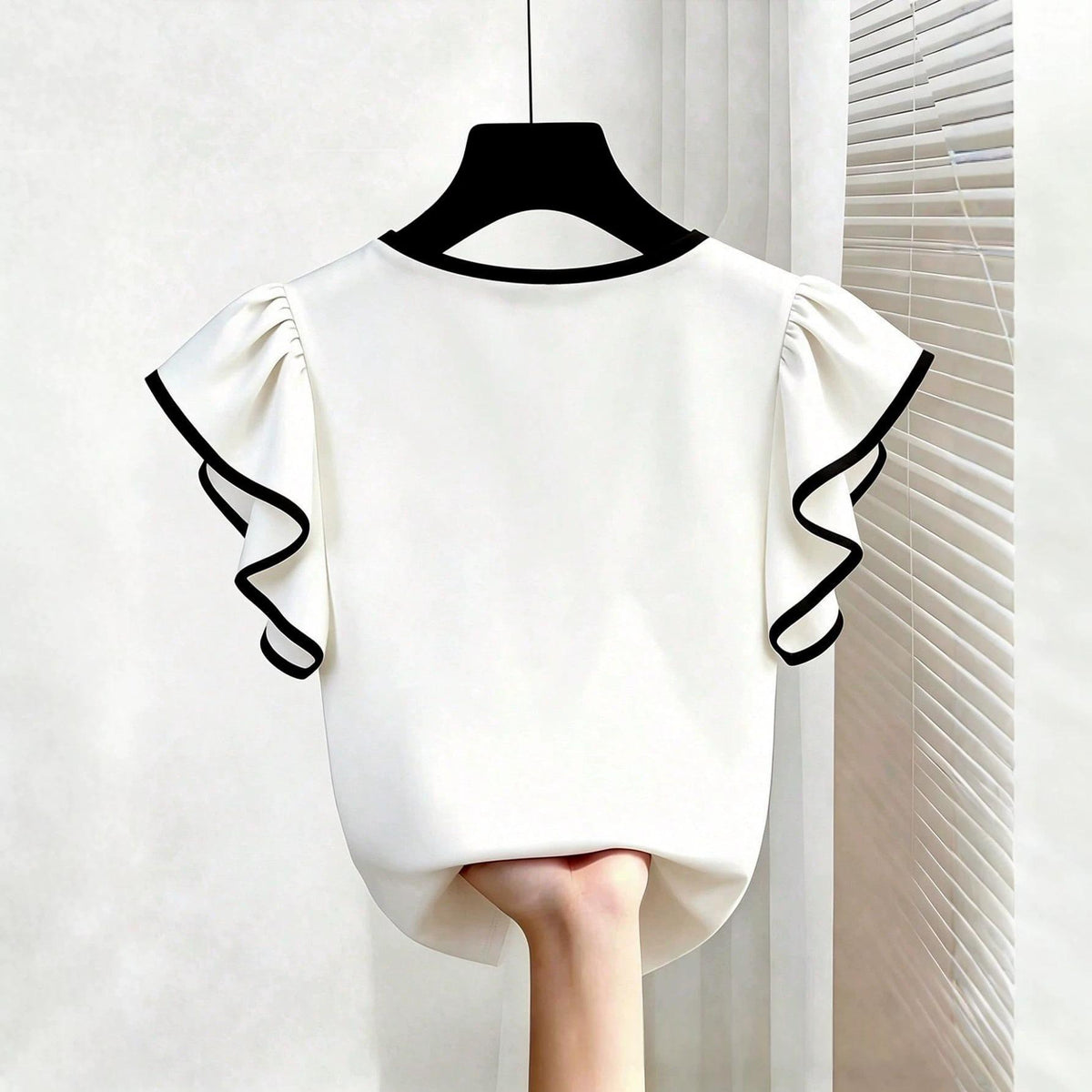 Women's elegant ruffle-sleeve blouse